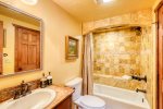 Guest  Bathroom features Tub & Shower Combo